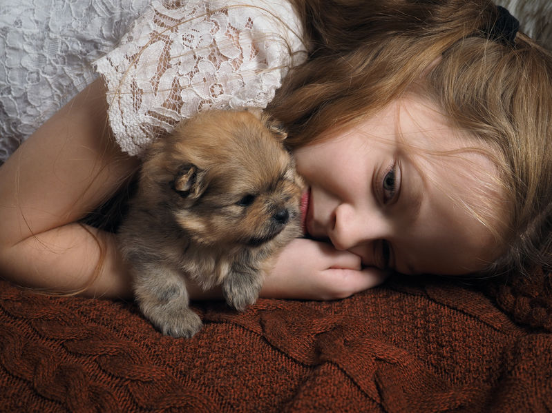 girl-resting-with-pup.png